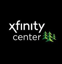 Xfinity Center logo on a black background with white text and green pine trees