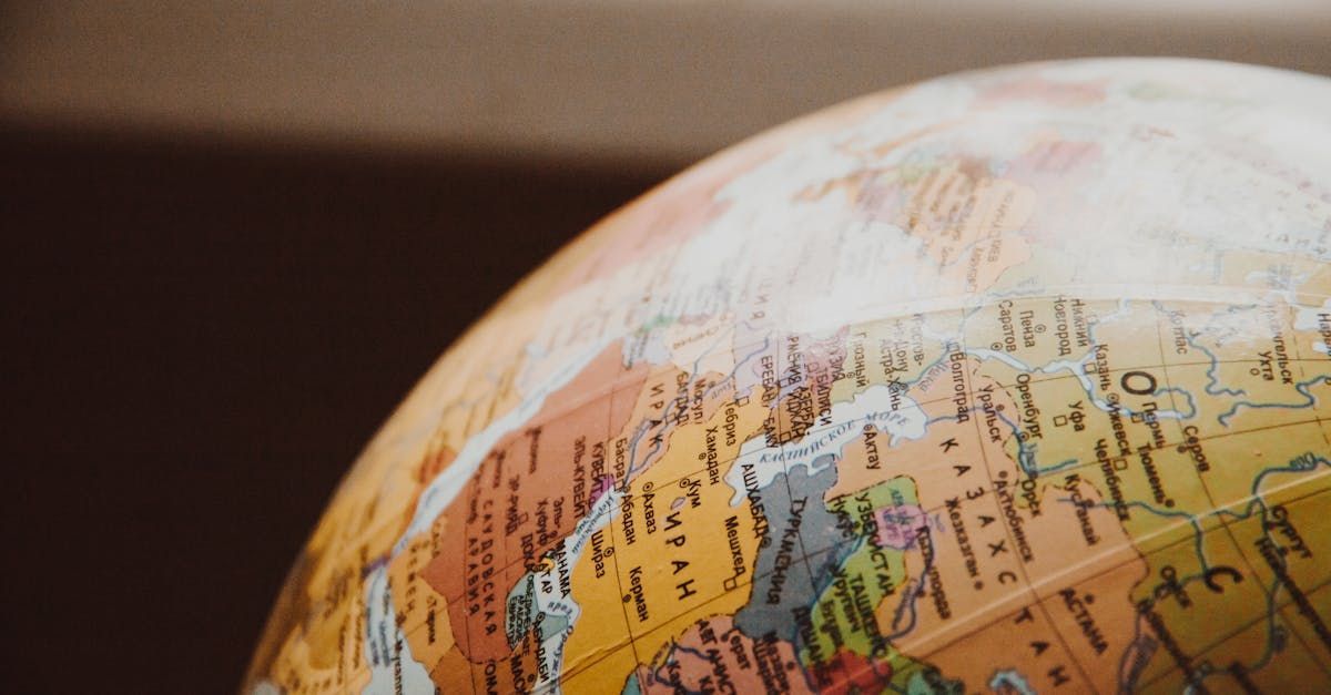 A close up of a globe on a table.
