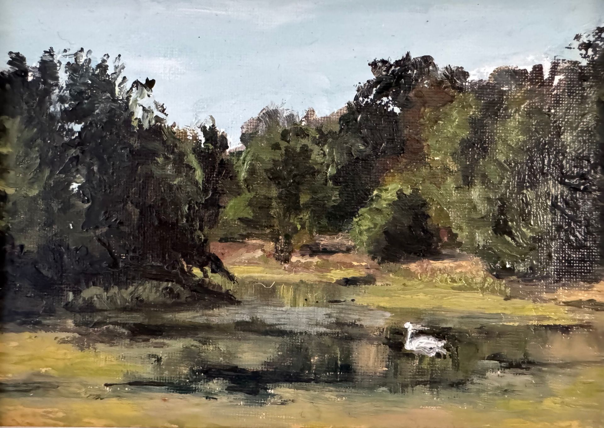 Impressionist landscape of a pond with trees, green banks, and a white bird near the water