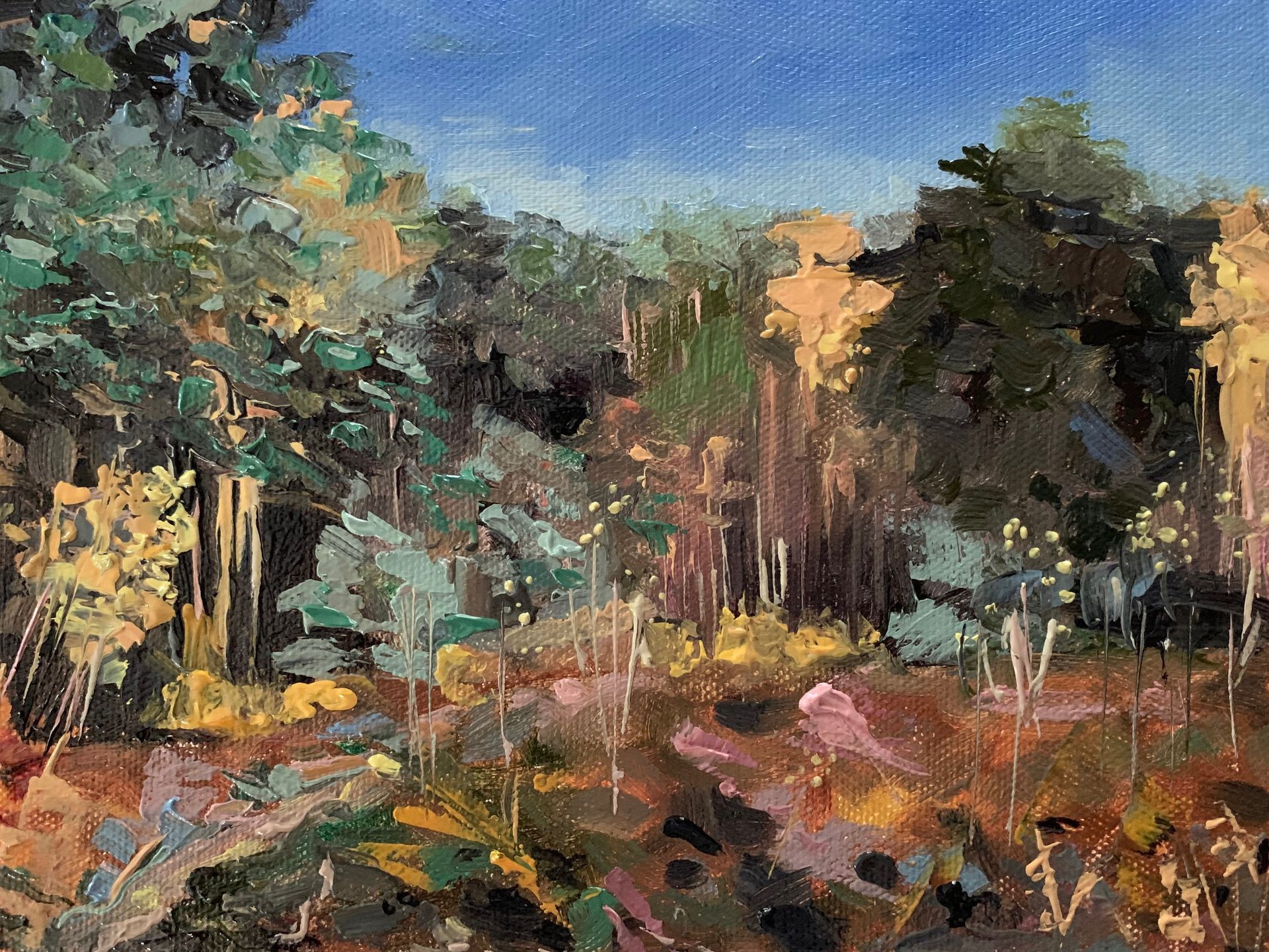 Impressionist garden scene with lush trees, flowers, and a blue sky.