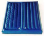 A blue inflatable mattress is sitting on top of a white surface.