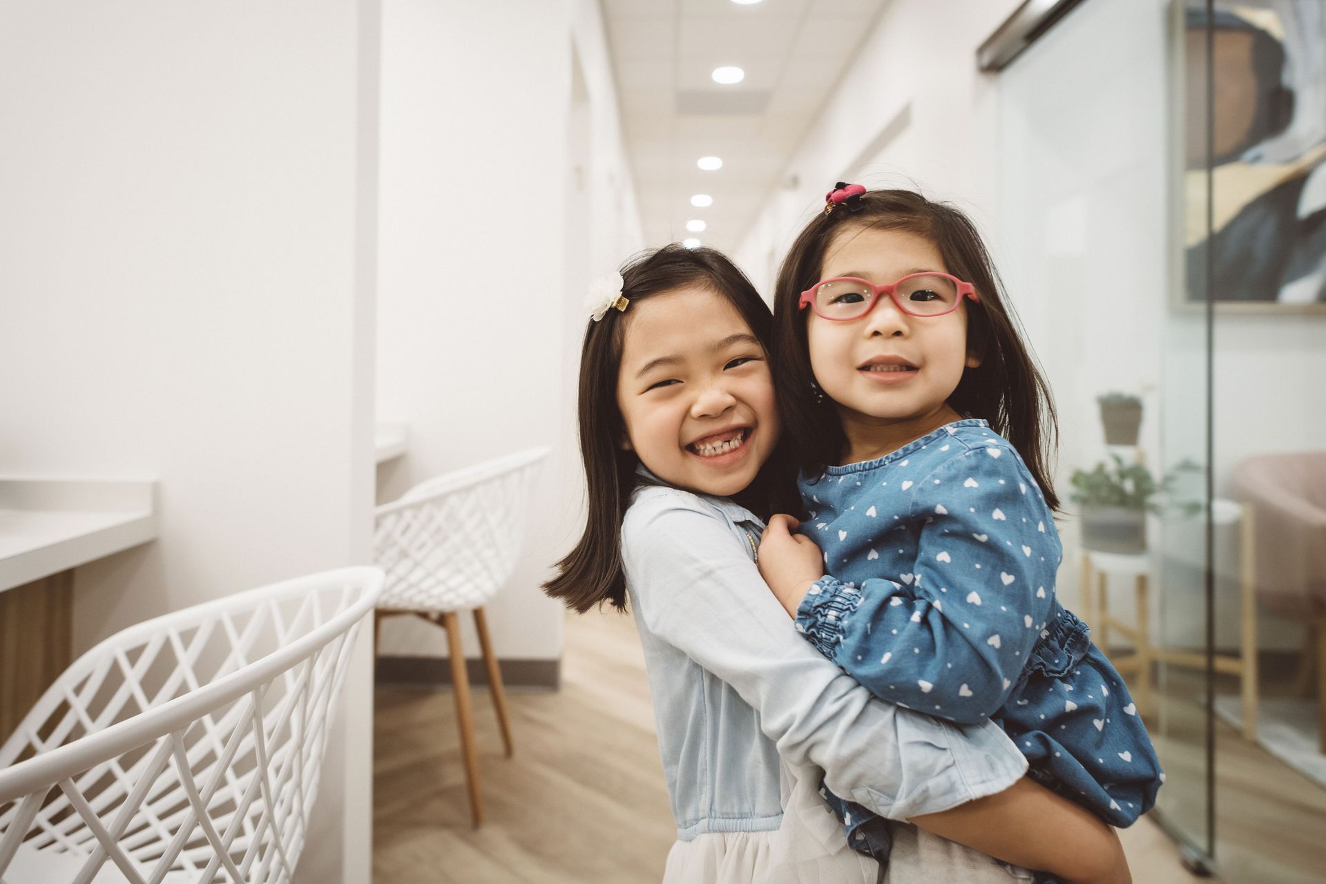 kids standing in the hallway at Embrey Family dentistry for pediatric dentistry