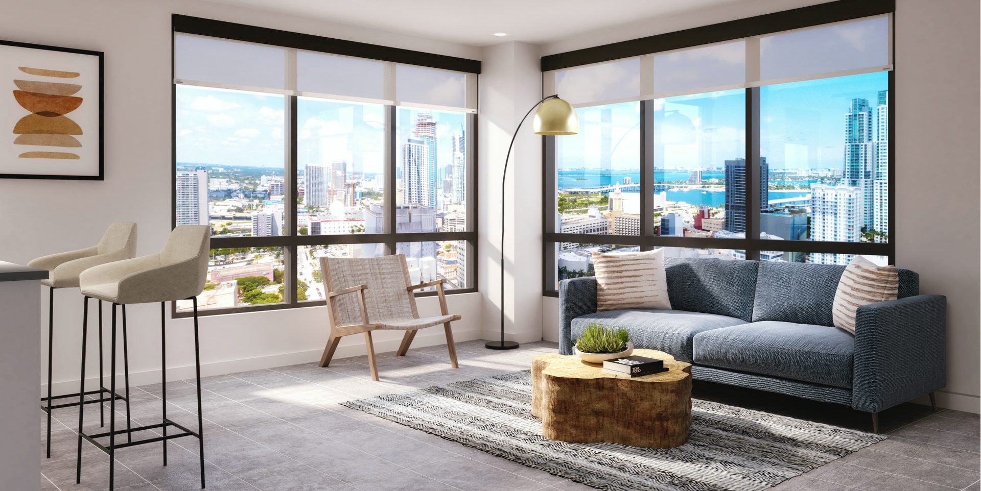 Modern apartment living room with large corner windows and city skyline view.