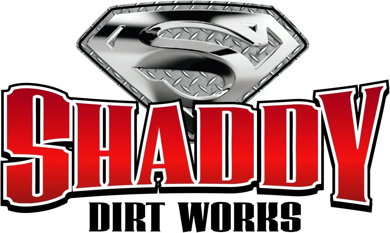 Shady Dirt Works logo with a chrome Superman-style emblem above red and black text