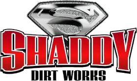Shiny silver diamond logo above bold red “SHADY” and black “DIRT WORKS” text