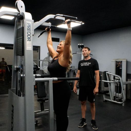 Personal trainer Evan coaching a one-on-one session at Fitness at KT Black, Amarillo TX