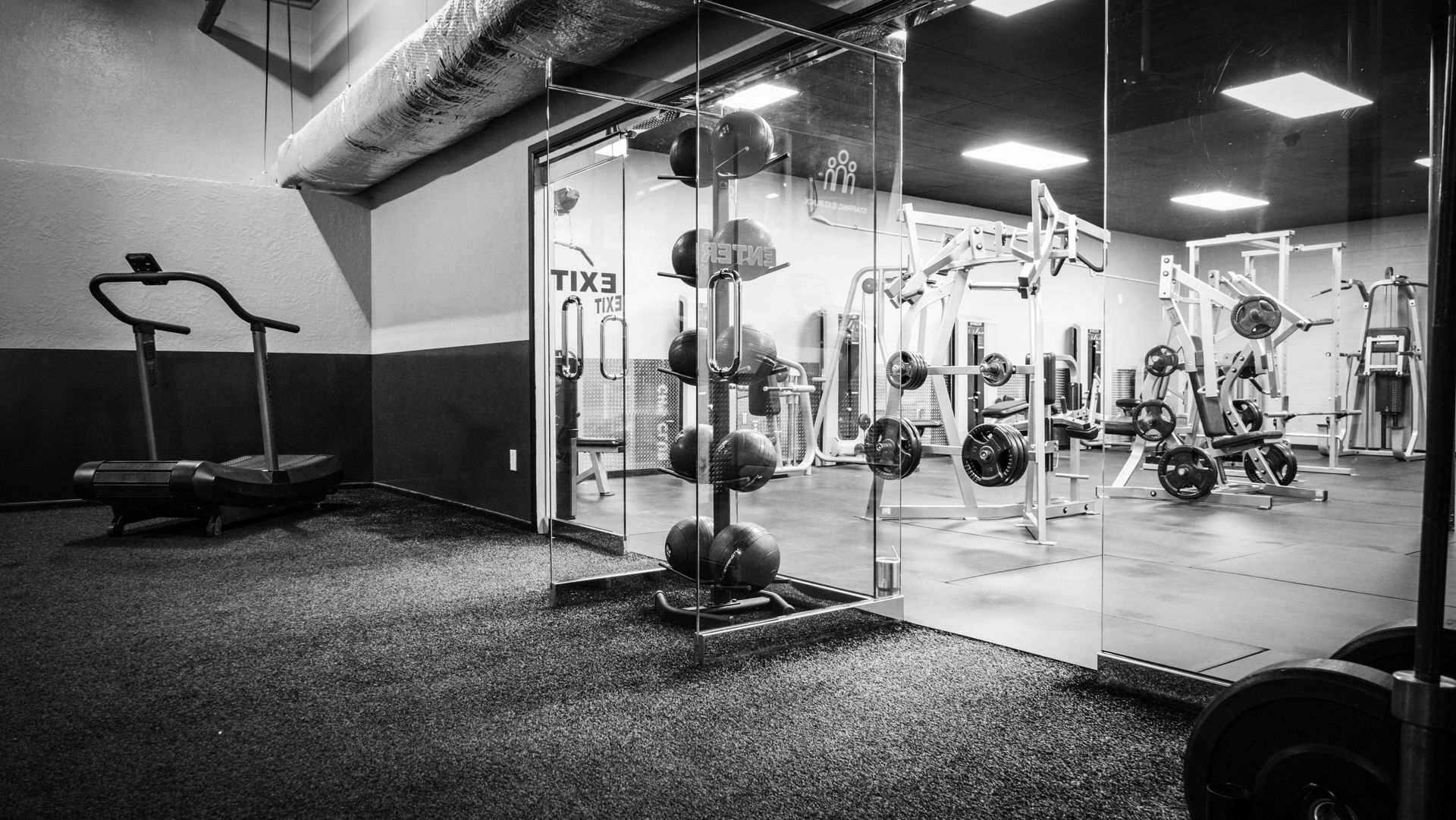 Weight machines and training floor at Fitness @ KT Black private personal training studio, Amarillo TX
