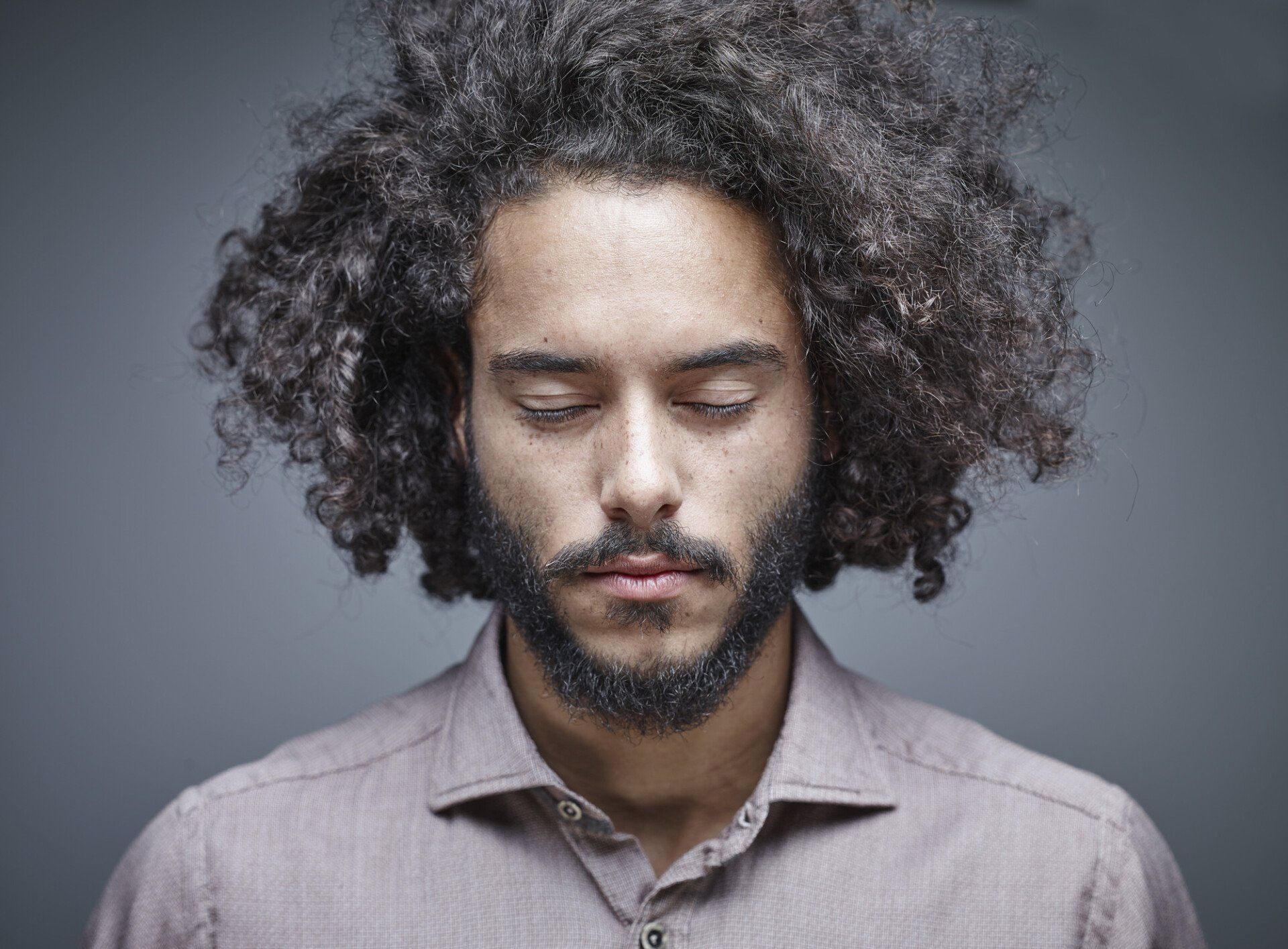 male model with eyes closed