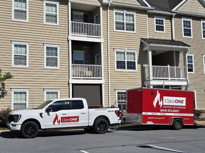 ClassONE truck and emergency trailer on site at a multi-unit apartment property