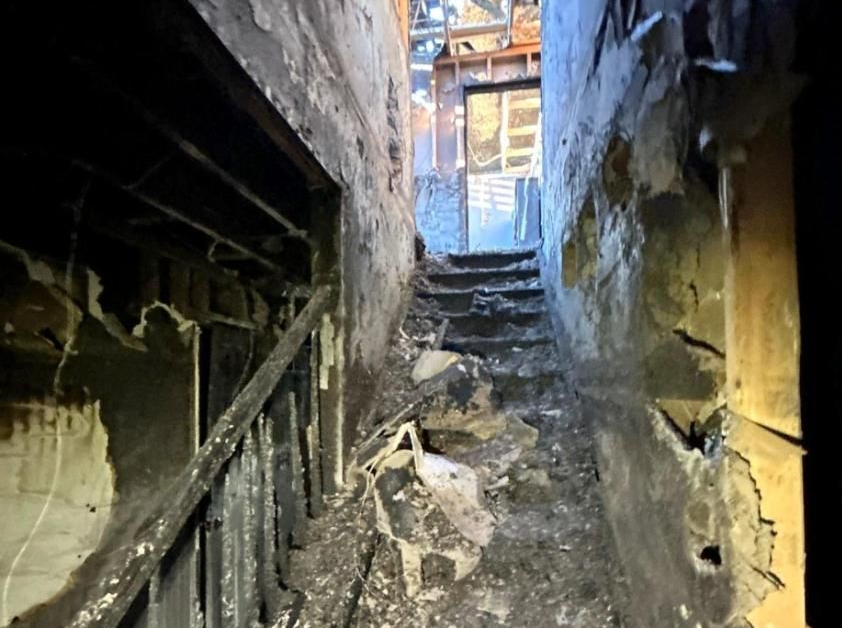 Smoke-damaged stairwell before ClassONE restoration in Lebanon, PA