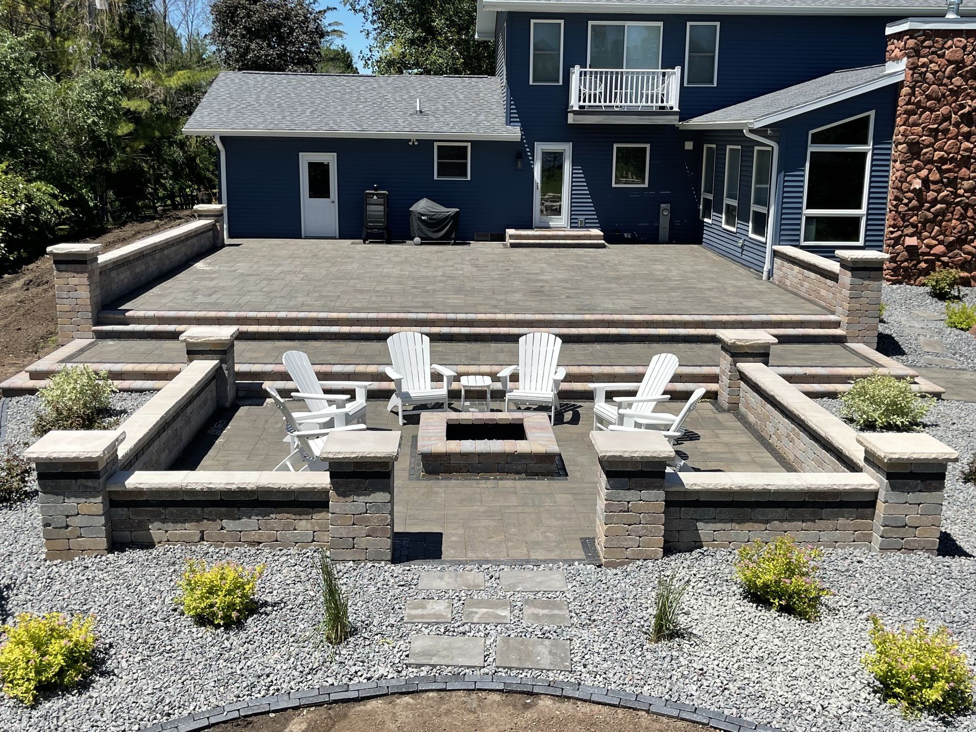 Concrete patio foundation installation for a Wisconsin backyard outdoor space