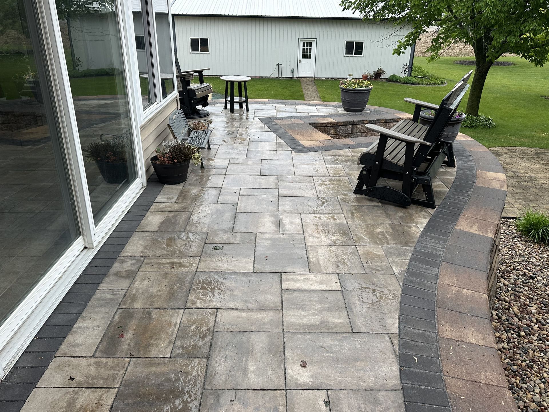 Concrete patio foundation installation for a Wisconsin backyard outdoor space
