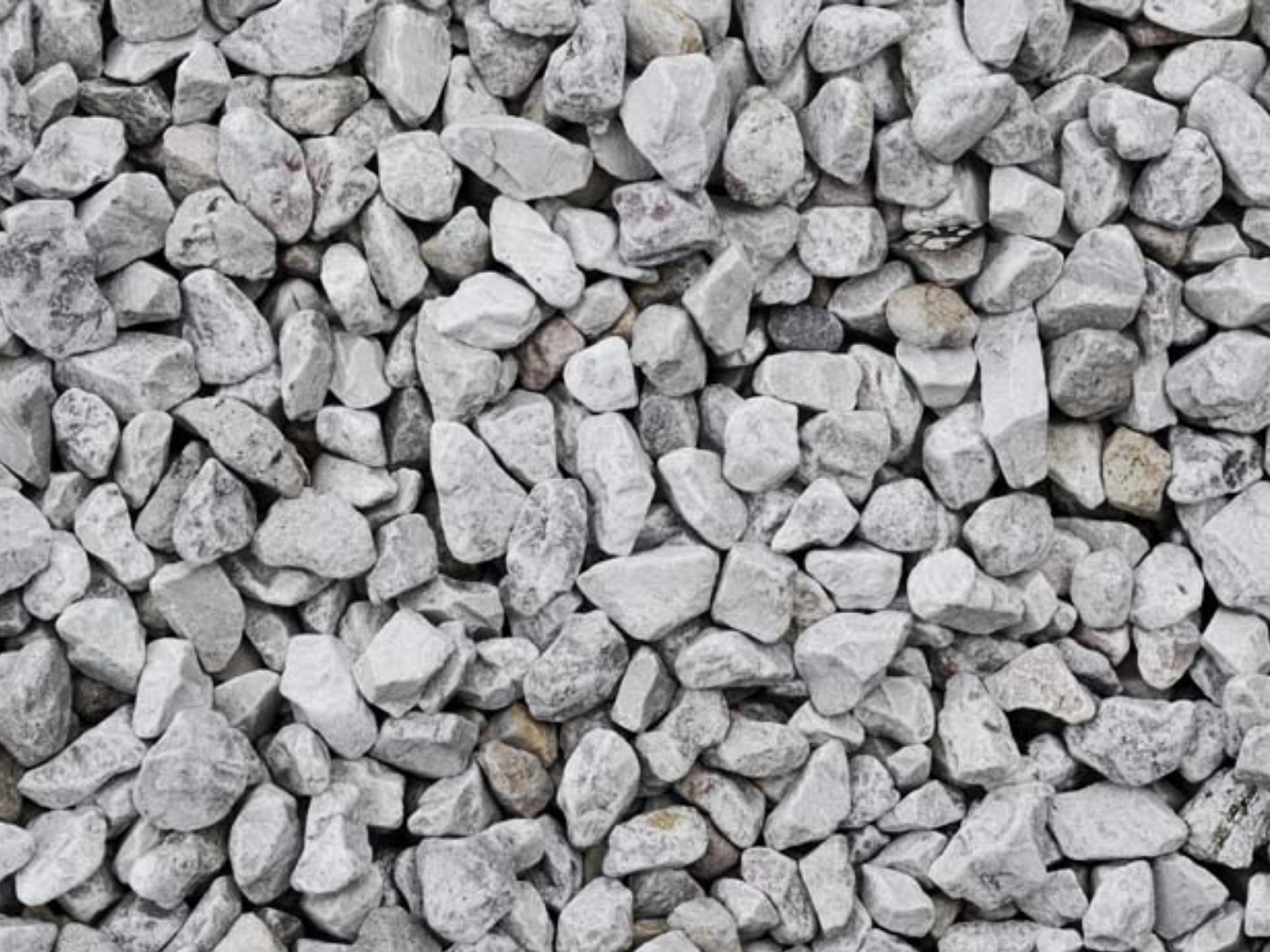 Pile of small gray rocks and gravel filling the frame