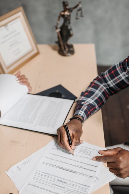 Business owner organizing company compliance records