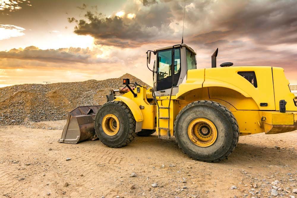 Excavator In The Construction Of A Road — Ingham Concrete–Icon in Ingham, QLD