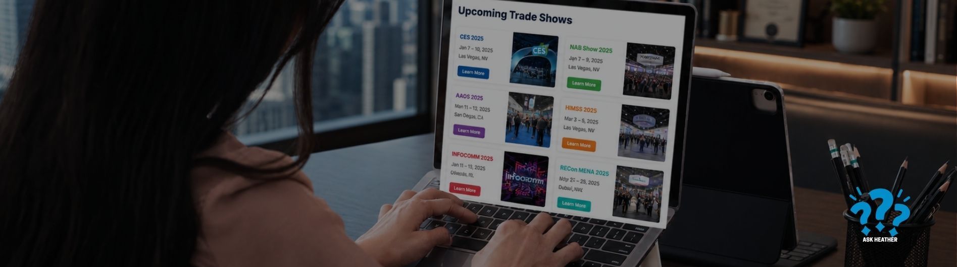 Person browsing a grid of colorful apparel on a laptop while seated indoors