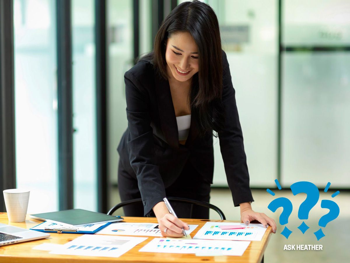 Picture of a Marketing Director looking at financials and positive ROI
