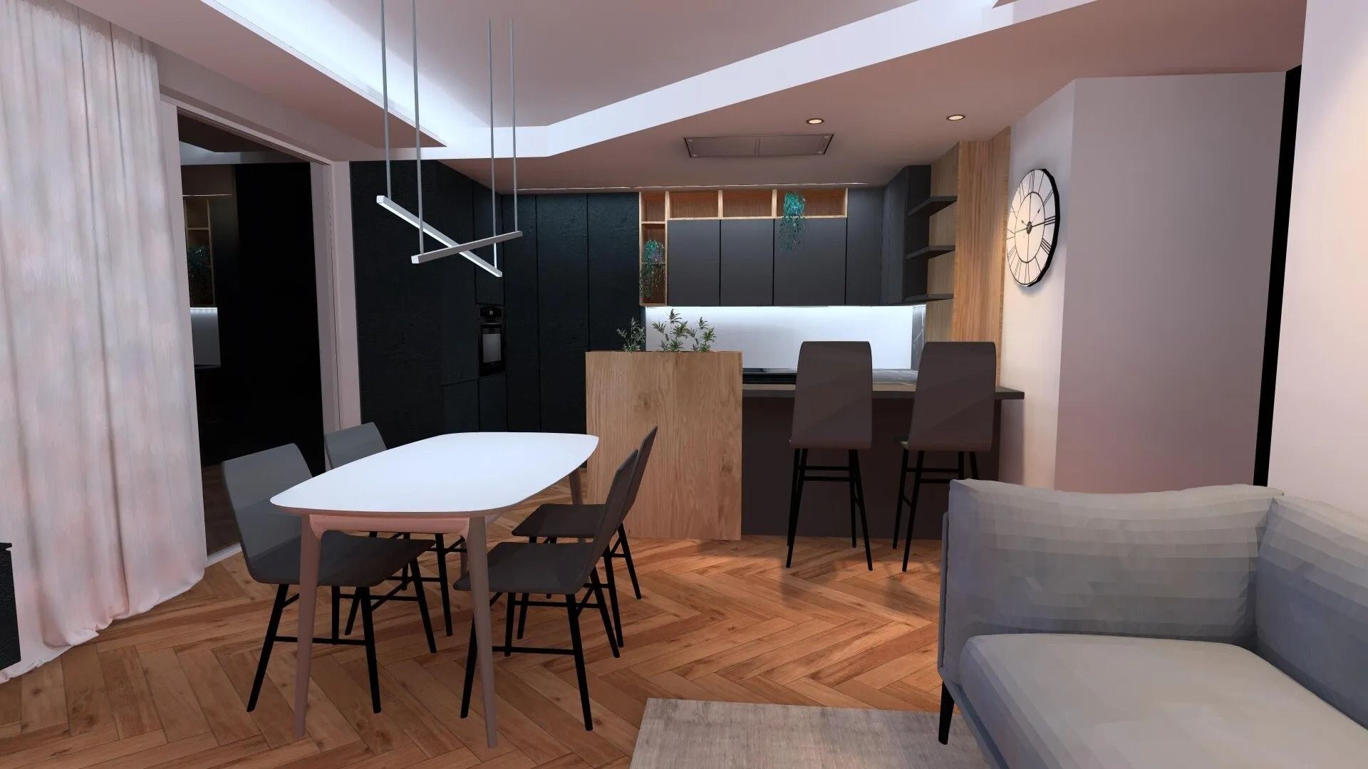 Cucina e zona pranzo moderne a pianta aperta con pavimento in legno, sedie nere, tavolo bianco e divano grigio.