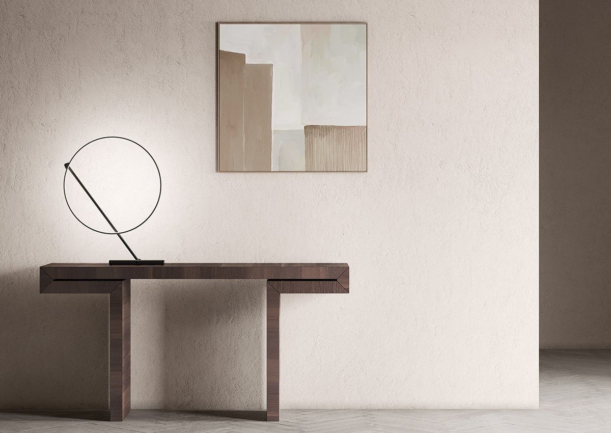 Consolle minimalista con scultura circolare in filo metallico e opera d'arte astratta da parete