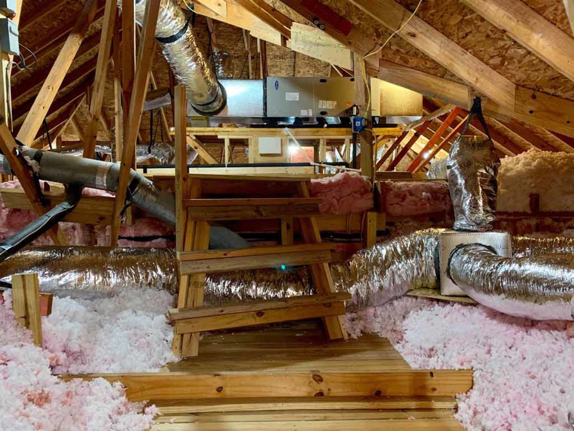 there is a ladder in the attic of a house .