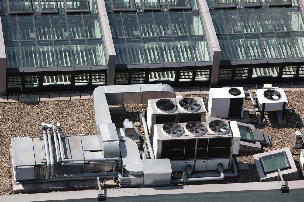 Rooftop View of Multiple Hvac Units With Large Fans in Campbelltown