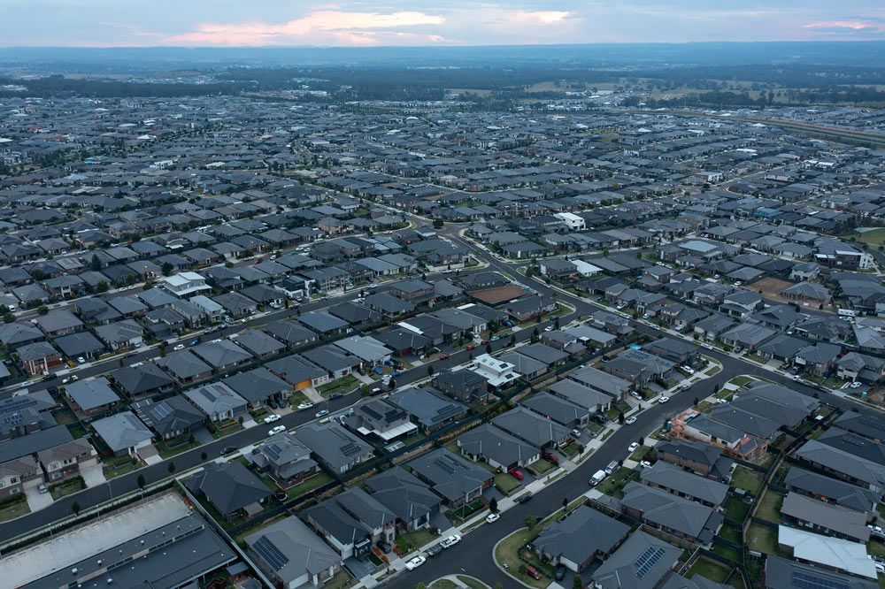 An Aerial View of A Residential Area with Lots of Houses — Revive Air Conditioning in Oran Park, NSW