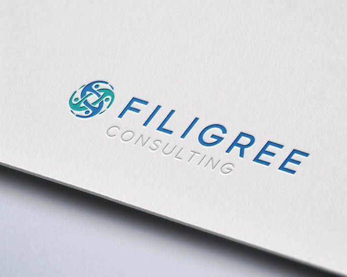 The logo for filigree consulting is on a piece of paper