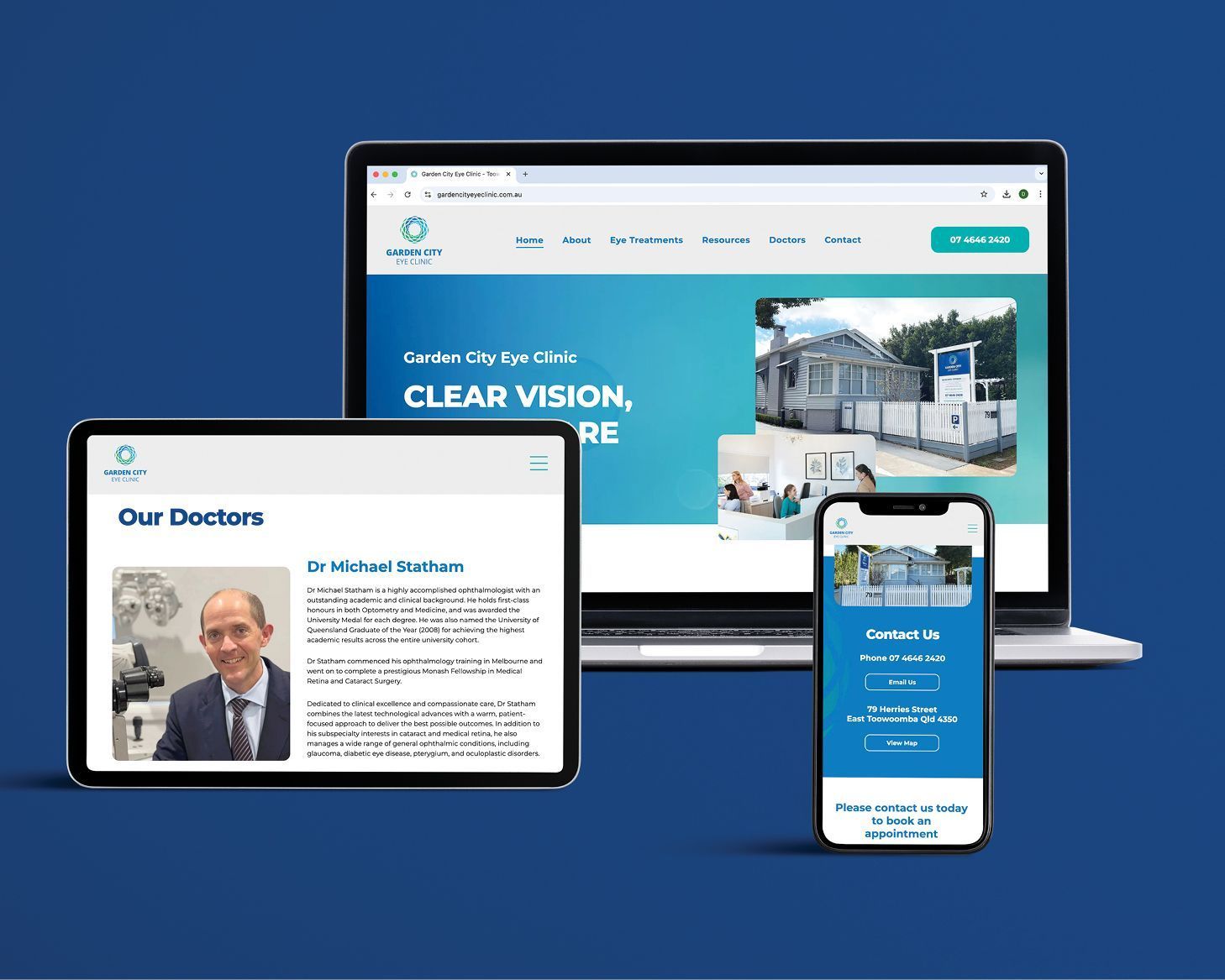 Website displayed on laptop, tablet, and phone against a blue background