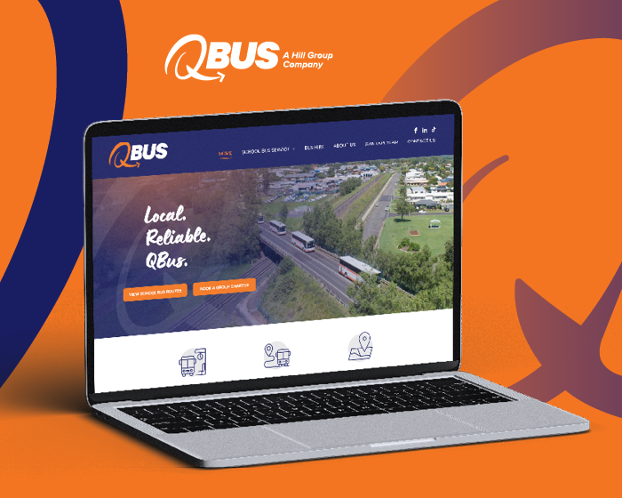 QBUS website displayed on a laptop against an orange background with blue wave accents