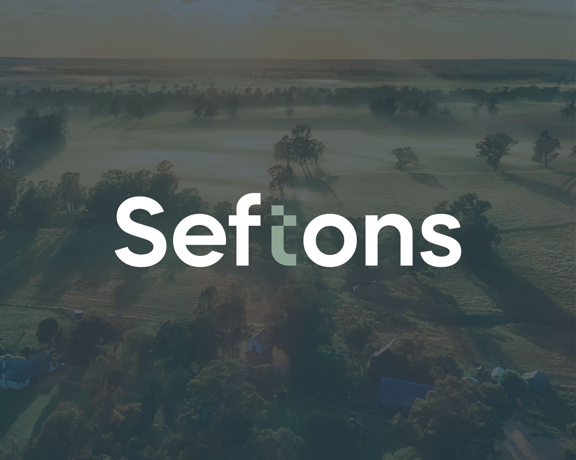The word eftons is on a dark background with trees in the background.