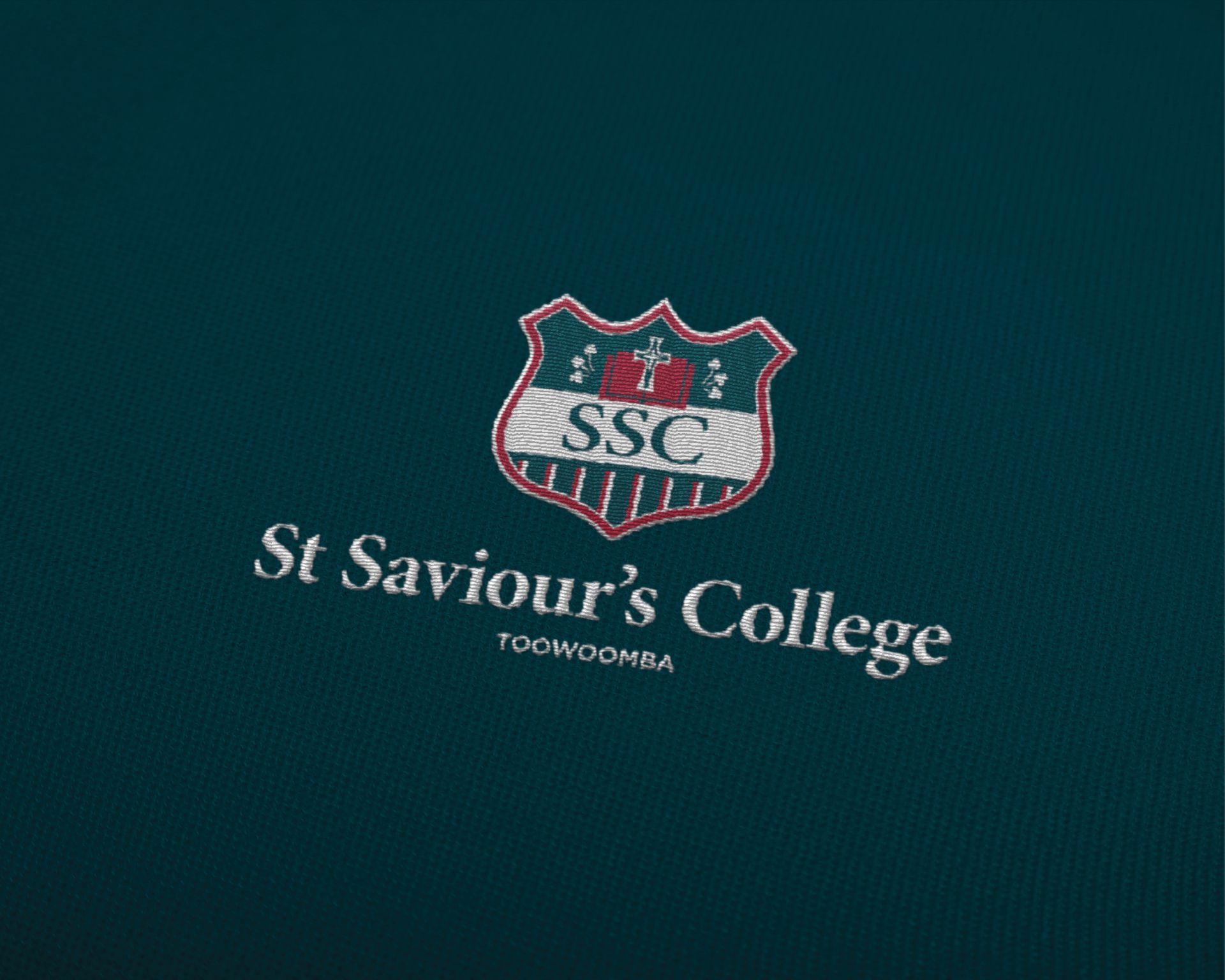 St Saviour’s College crest and name on a dark green background