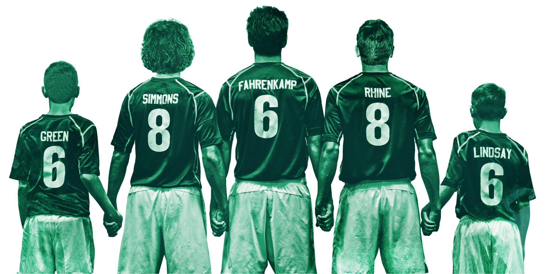 Five soccer players in green jerseys standing with backs to camera on a field