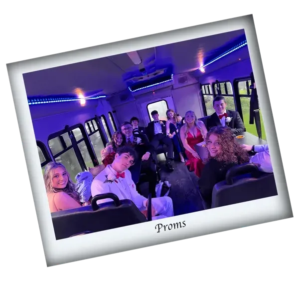 People smiling inside a purple-lit party bus, seated around tables