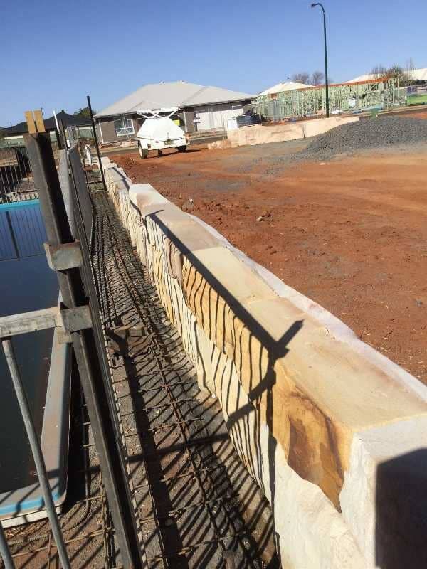 New Fencing Being Installed Around Pool — Pool and Landscaping in Dubbo, NSW