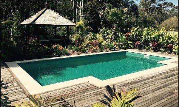 Pool With Hanging Umbrella— Pool and Landscaping in Dubbo, NSW
