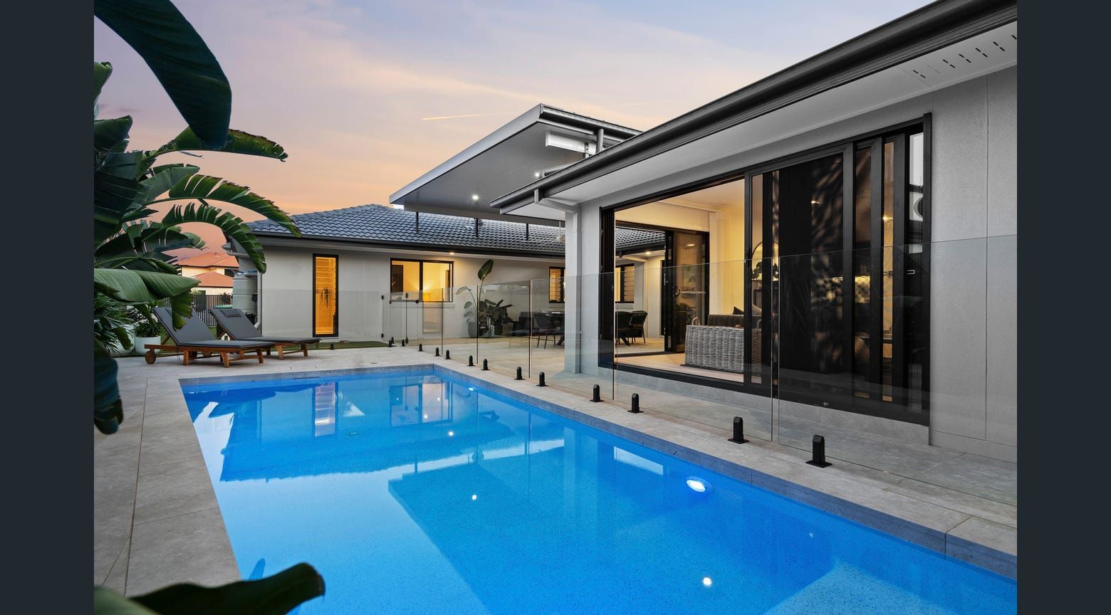 Frameless glass pool fencing installed by HARJET