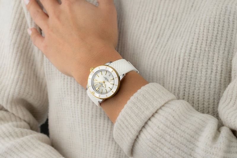 Breitling Superocean Heritage Automatic 36 D10390A71A1S1 with white dial, yellow-gold bezel and white rubber strap