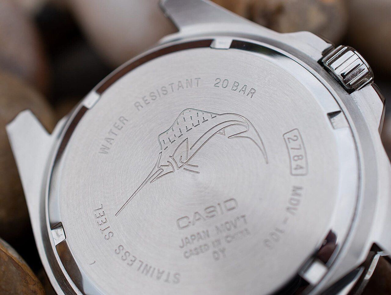 The screw-down steel caseback of a Casio MDV-106, engraved with the leaping marlin Casio uses to mark its 200-metre dive models.