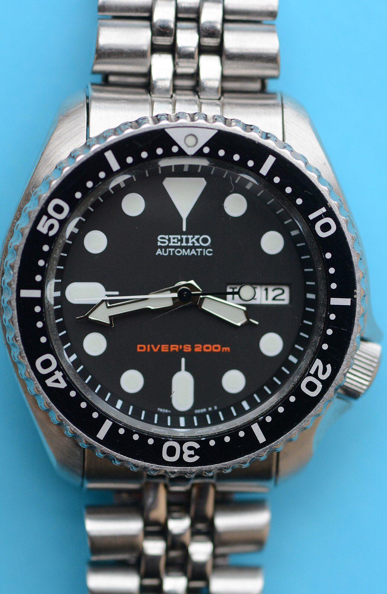 A Seiko automatic diver's watch with black dial and bezel