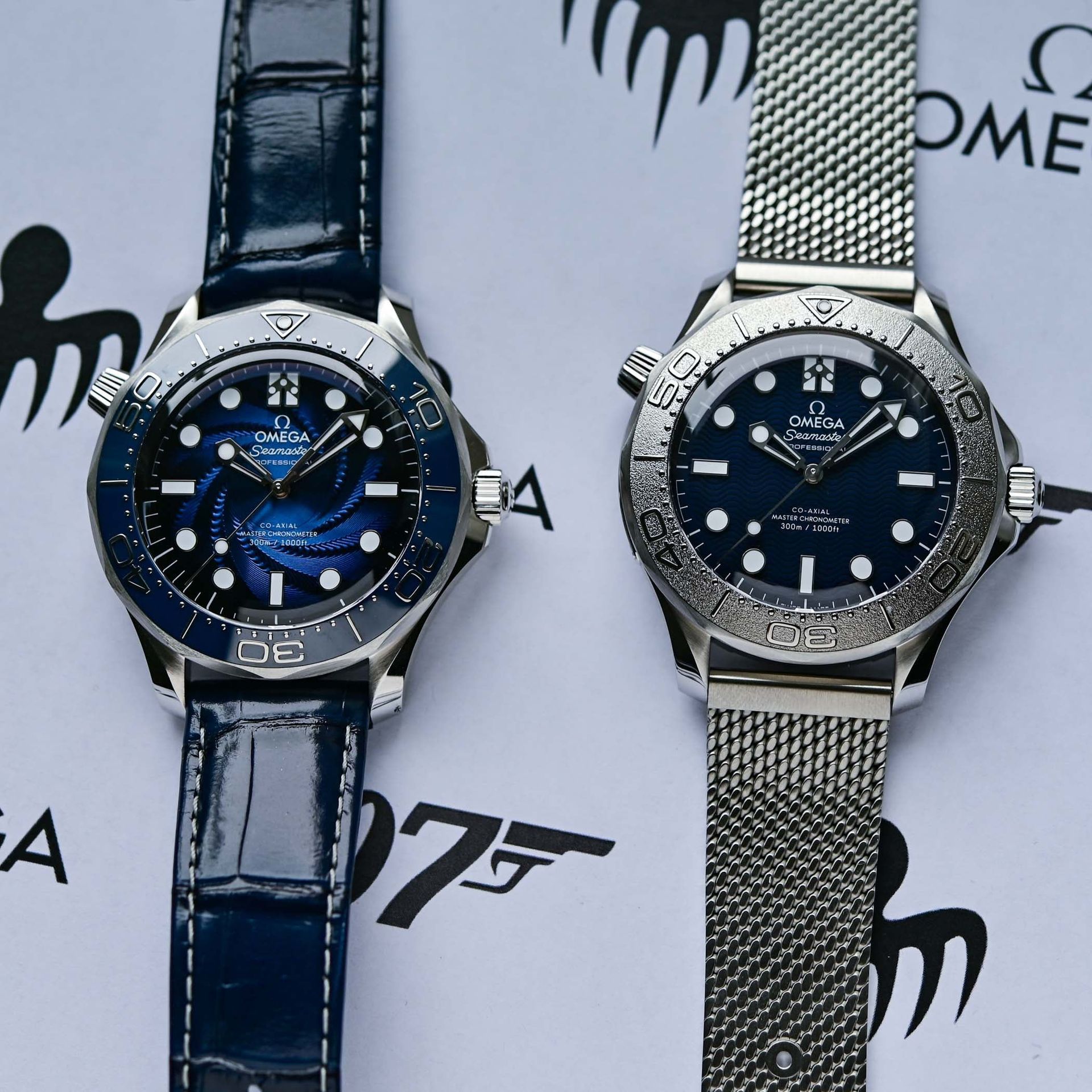 Omega James Bond limited set: platinum-gold Seamaster on blue alligator strap and steel Bond edition on mesh