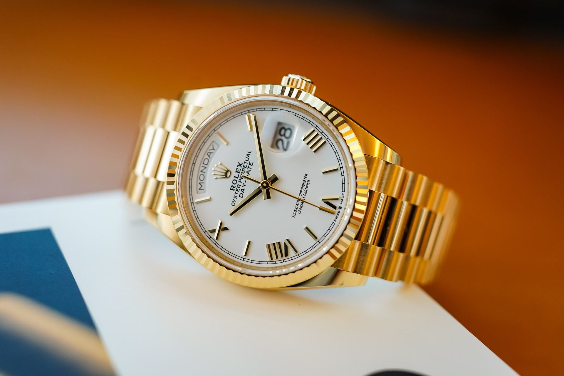 Rolex Day-Date 40 President in yellow gold with fluted bezel and President bracelet