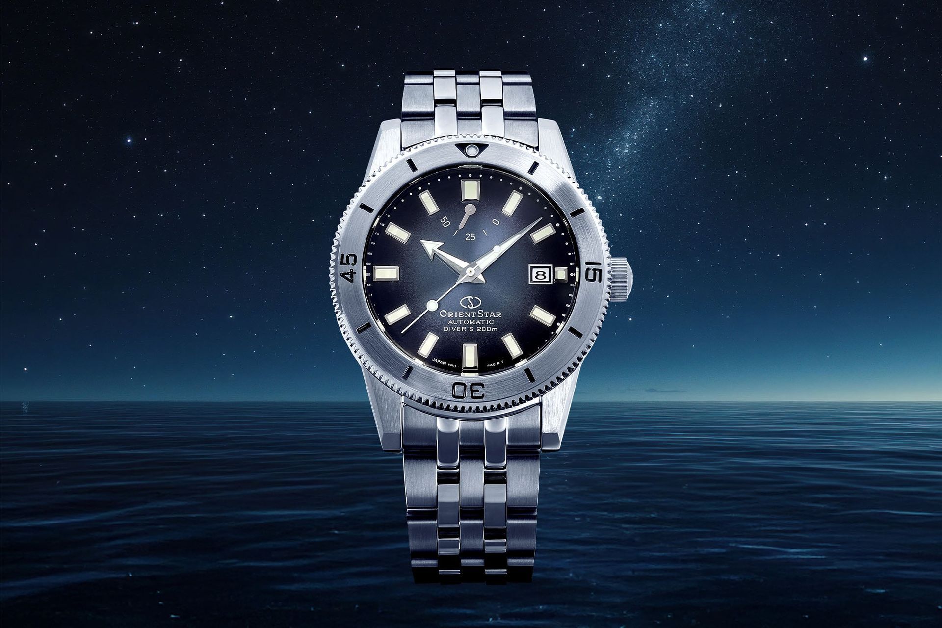 The 2026 Orient Star 75th Anniversary M42 Diver 1964 1st Edition (ref. RE-AU0503N), with its coin-edged unidirectional bezel and power reserve indicator.