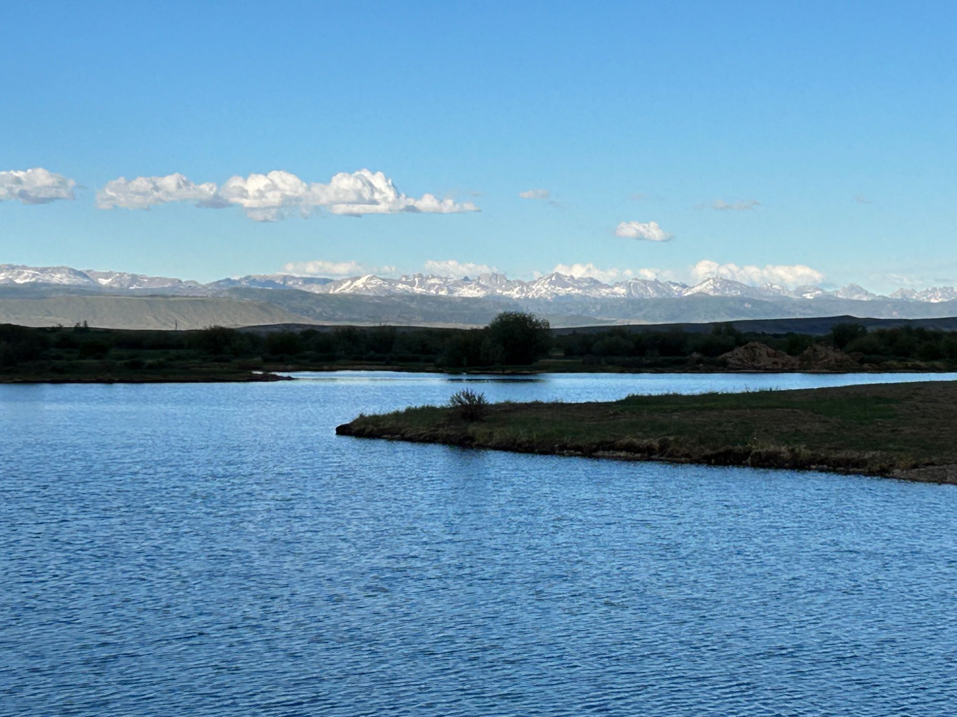 Jemas Ranch's largest lake with a view of the Wind River Range. 
