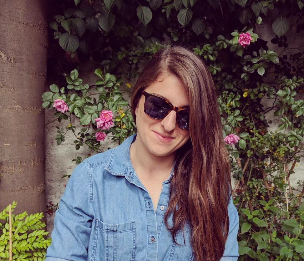 Krysten Kamps wearing shades in close-up portrait