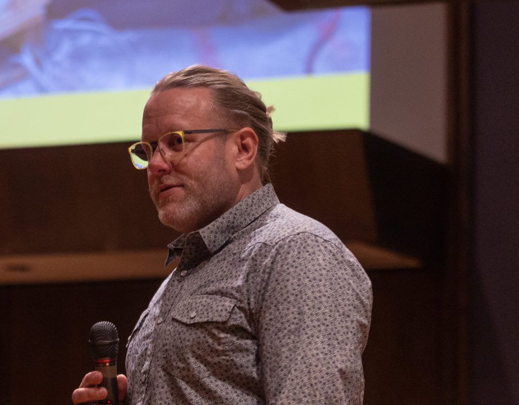Seth Tucker speaking at a public event