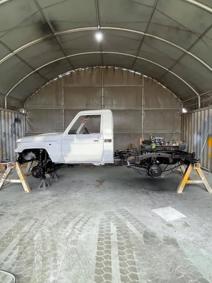 Partially Restored White Pickup Truck in a Workshop — All Blast and Paint in Sarina, QLD