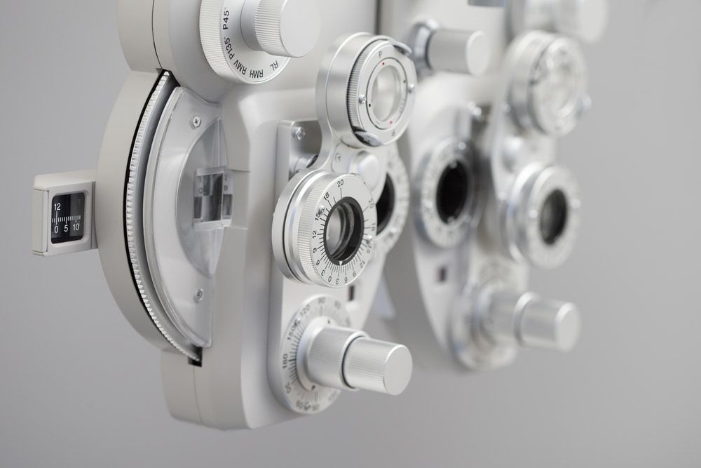 A Close Up of a Pair of Eye Testing Machines Hanging on a Wall — Eyepower In Wilton, NSW