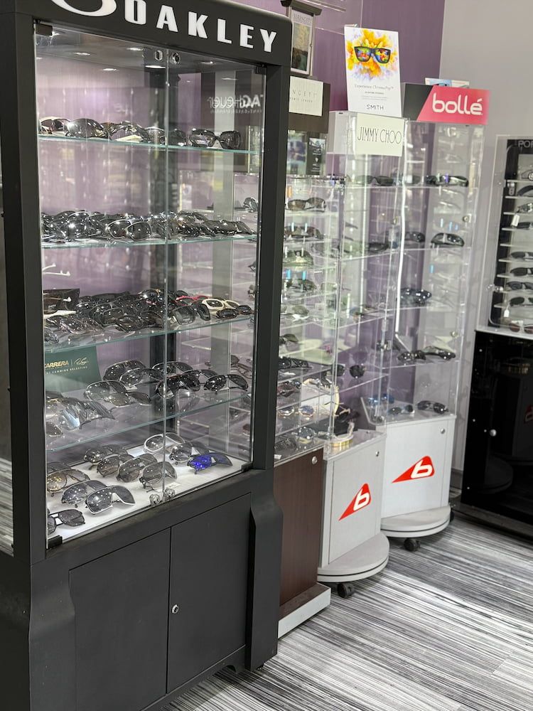 A Wall Filled With Sunglasses — Eyepower In Tahmoor, NSW