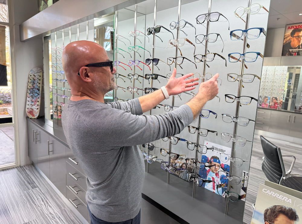 Man Shopping for Eyeglasses at an Optical Shop — Eyepower In Tahmoor, NSW