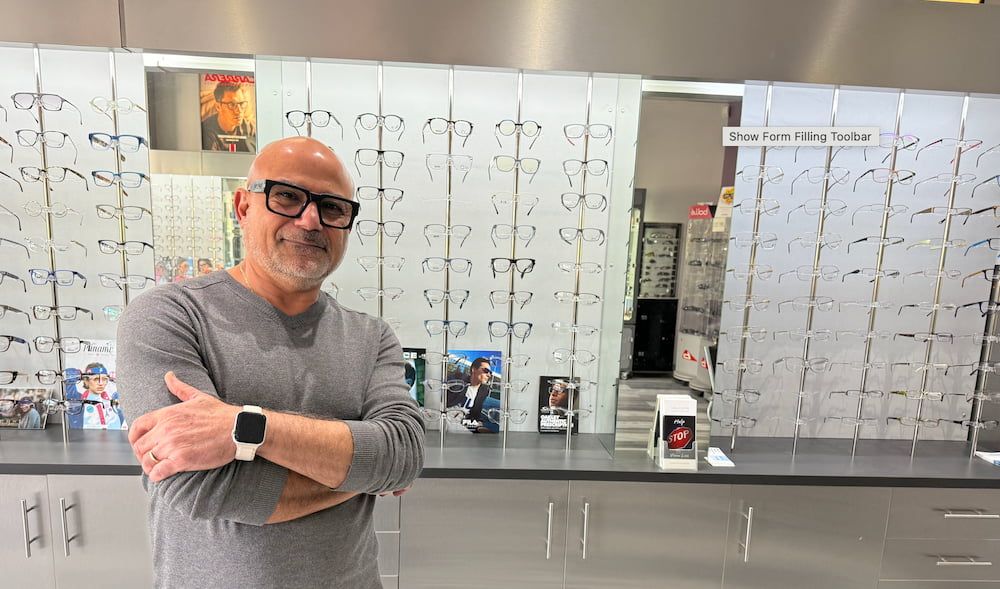 Man Wearing Glasses in Eyeglasses Store — Eyepower In Buxton, NSW